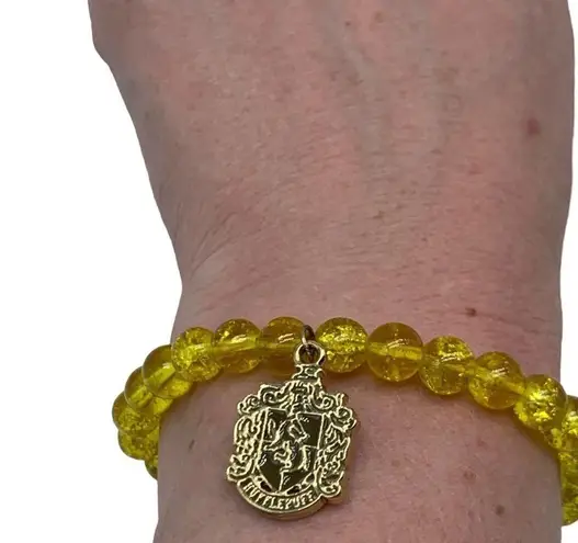 Harry Potter TM & WBEI (s17) Hufflepuff gold and yellow stretch fashion …