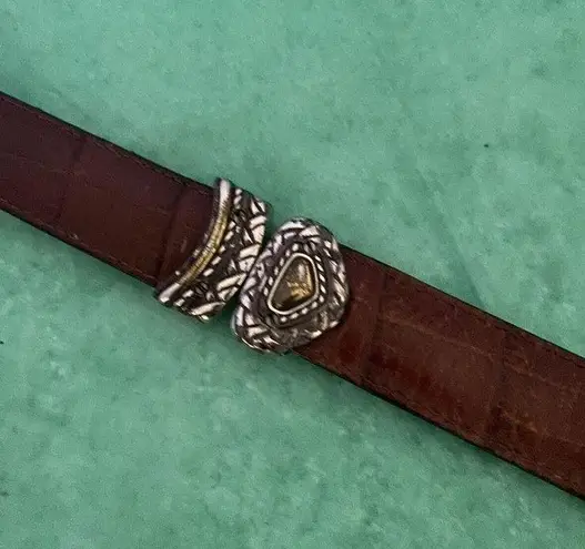 Ladies leather reversible belt black and brown with embellishments. Size med/30.