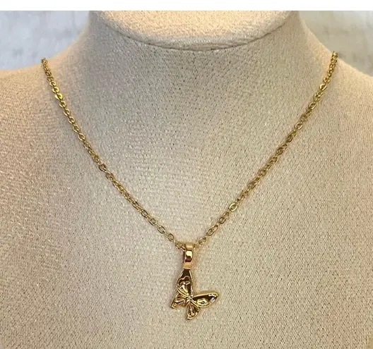Dainty gold tone butterfly necklace
