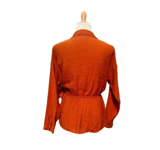 E & M women’s boutique wrap blouse S orange
