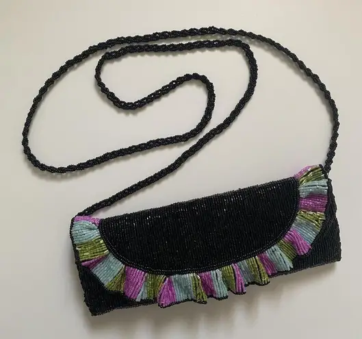 Vintage black beaded bag with pink, blue, and green ruffle trim - Image 1