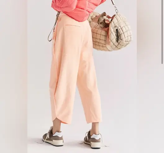 Free People Movement NWT TIMKO Pants In Peach Combo  $148 MSRP Peach Combo  No refunds or cancellations thumbnail 2