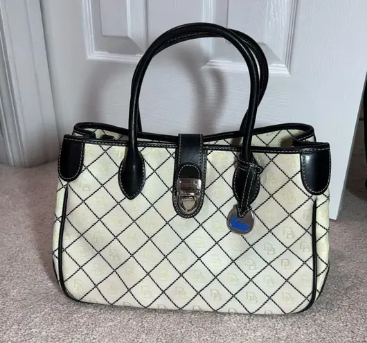 Dooney & Bourke   Black and Cream Logo Satchel with blue duck bag charm