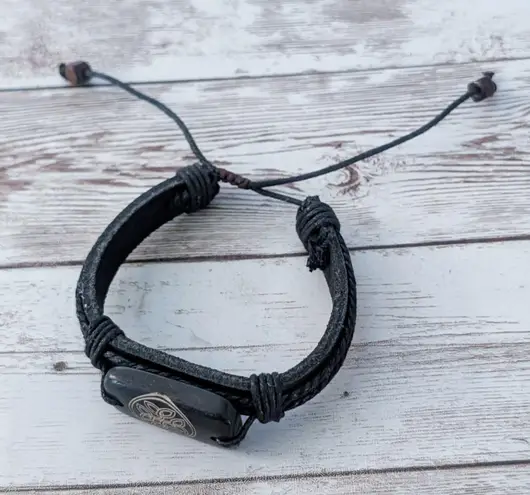 Tie Bracelet with Celtic Like Charm