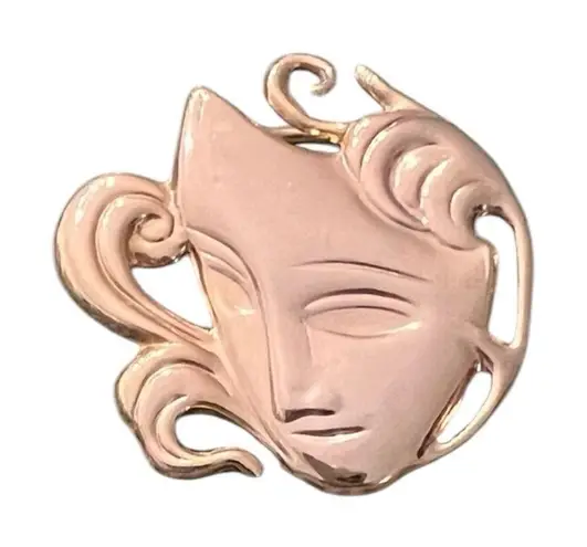 Vintage Pretty gold colored scarf clip with a woman’s face EVC