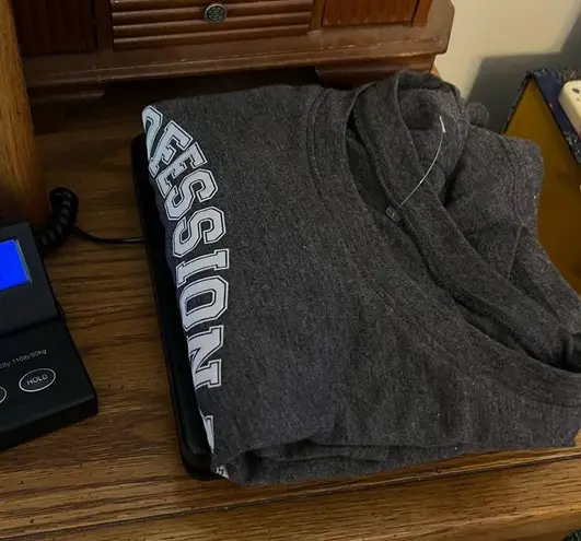 Professional Binge Watcher Hi Low T Shirt New! Read about size 18.5” pit to pit