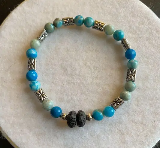 Fun handmade stretch blue beaded bracelet silver separaters lava beads