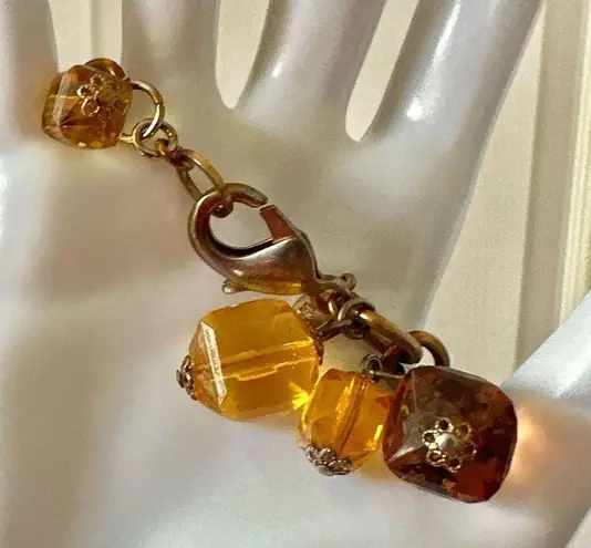 Joan Rivers  amber tone beaded charm bracelet