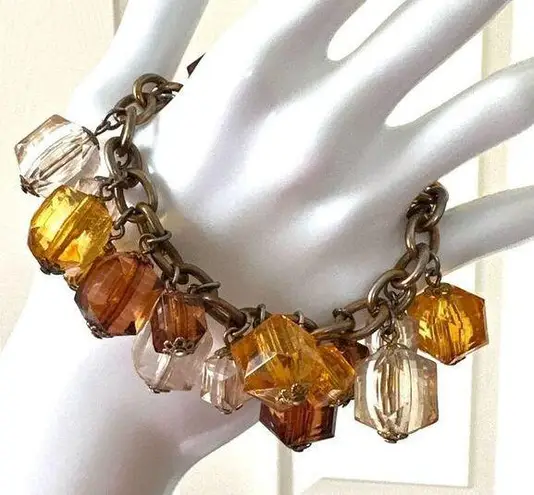 Joan Rivers  amber tone beaded charm bracelet