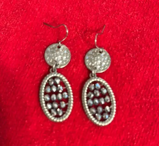Stylish Silver Dangle Earrings with Textured Design and Dark Bead Accents
