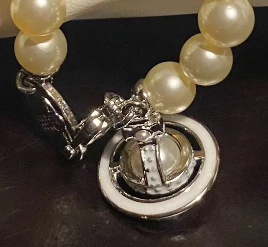 Vivienne Westwood  faux pearl and Saturn orb pendant choker, new.