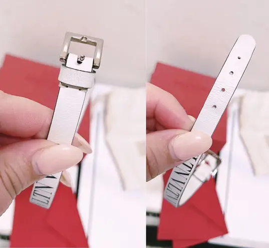 Valentino Garavani Authentic White & Black Thin Leather VLTN Buckle Bracelet