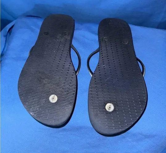 Havaianas  Size 9/10 Purple and Black Flip Flops