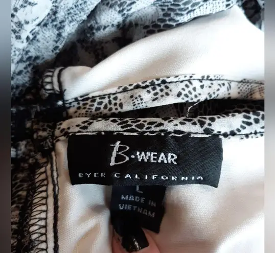 B. Wear black and white lace halter tank