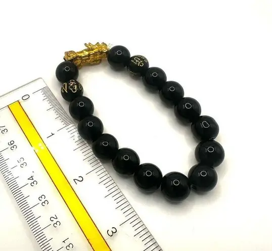 Gold tone dragon Feng shui lucky bracelet Black