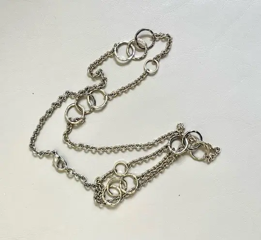 Long silver tone necklace with circles
