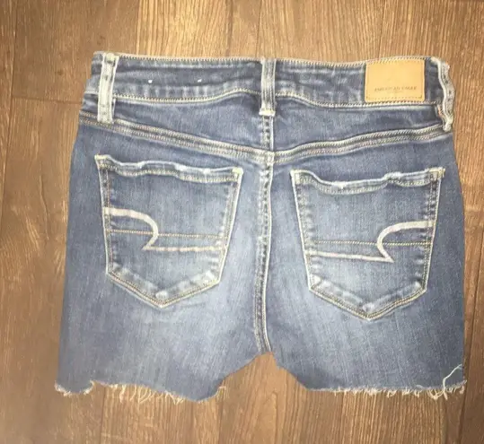 American Eagle size 4 high rise super stretch x cutoff shorts Blue