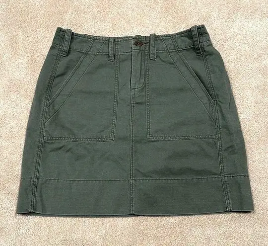 G1 Goods Green Mini Skirt Size 0 flaw missing button