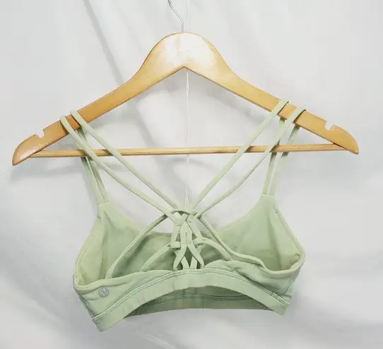 Lululemon  sports bra strappy back light green color size 4 (A-9)