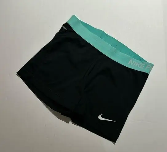 Nike  pro shirts Fri fit since large Tiffany blue and black