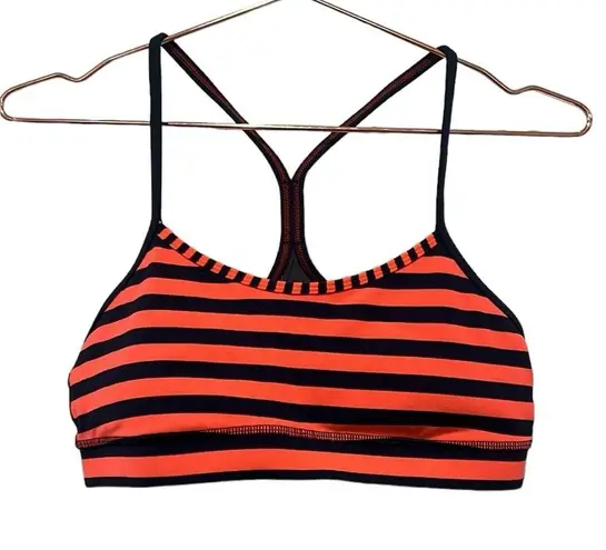 Lululemon  sports flow Y sports bra. Orange & blue stripes. Sea stripes color.