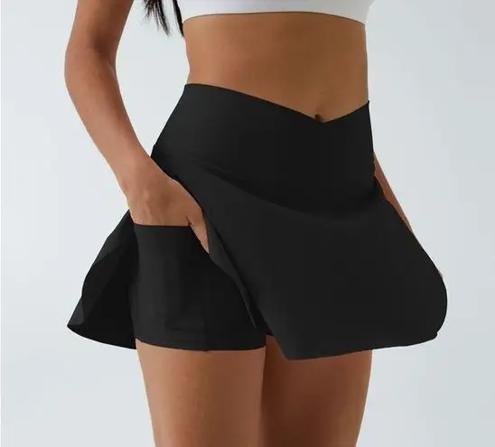 Halara 077HO.- Airy Crossover 2-in-1 Side Pocket Cool Touch Mini Tennis Skirt