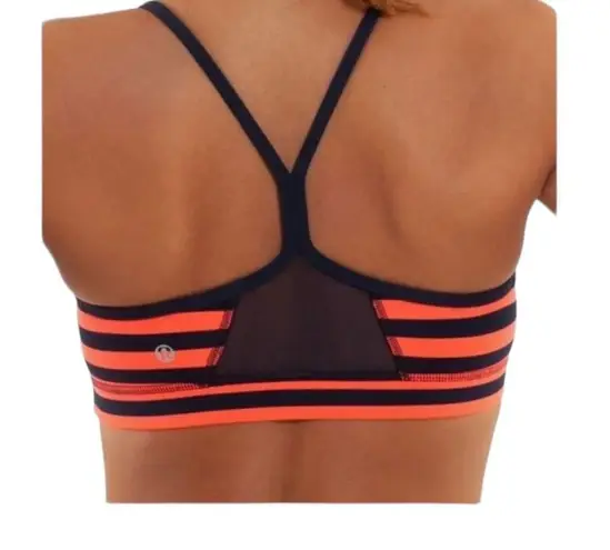 Lululemon  sports flow Y sports bra. Orange & blue stripes. Sea stripes color.