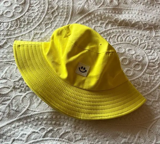 Amazon Bright yellow smiley face bucket hat