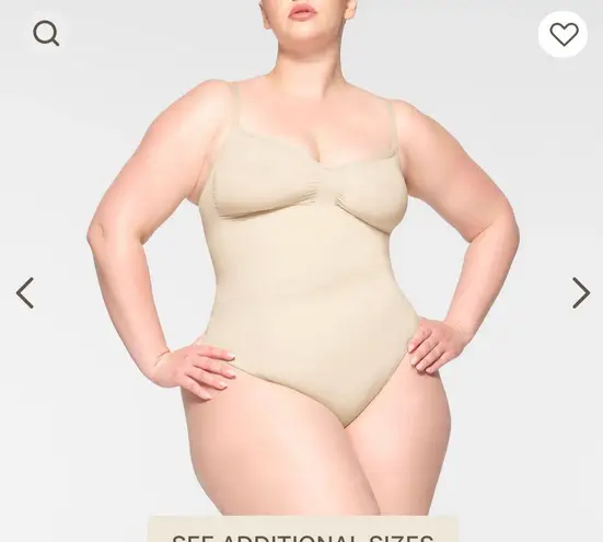 SKIMS Seamless Sculpt Thong Bodysuit in “Sand”