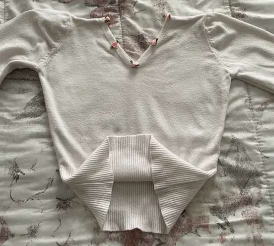 White Little Roses On V