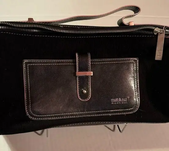 Montreal designers Matt & Nat black with pink piping, top handle bag.