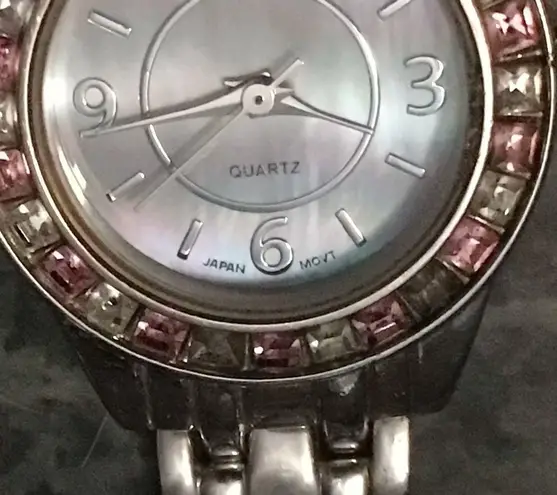 Pink jeweled watch