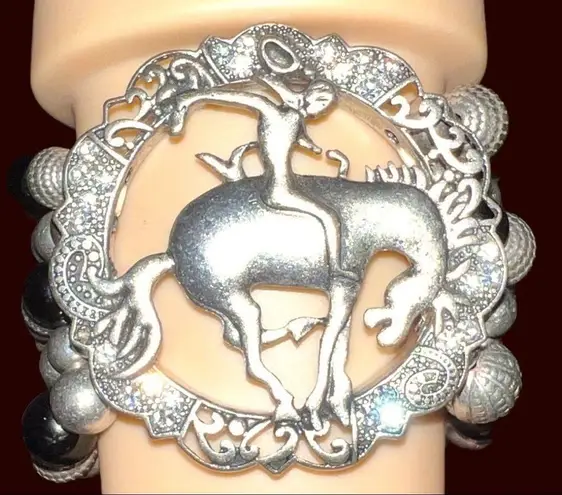 Unique silver and black beaded stretchy bracelet with silver cowgirl des…