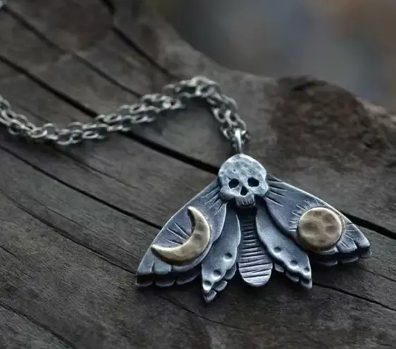 Vintage Style Skull Head With Asymmetric Sun Moon Double Wings Moth Pendant Silver