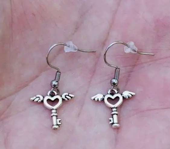 Silver key earrings brandy melville discount
