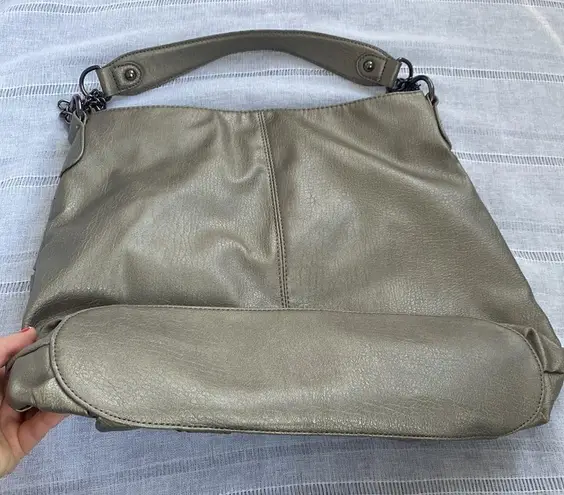 Olivia and Joy pewter hand bag with zipper embellishments.