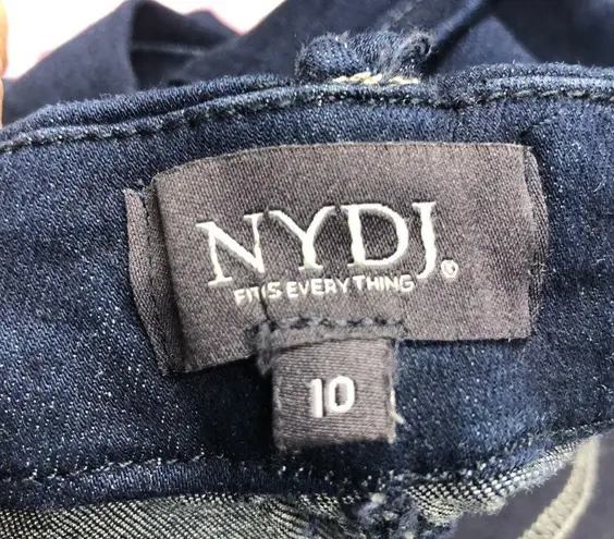 NYDJ Size 10 knee length, jean skirt with stretch ,pockets, and patches