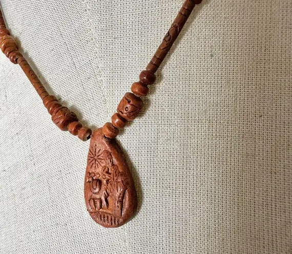 Peruvian wood beaded pendant necklace Brown