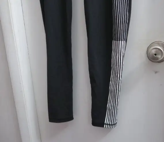 Victoria's Secret VSX sport knockout tight leggings in black, white and pink size medium.