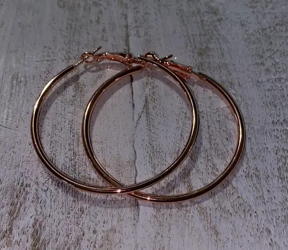 Large Pink rose gold hoops 2 1/2” new in package earrings oversized hoop dangle