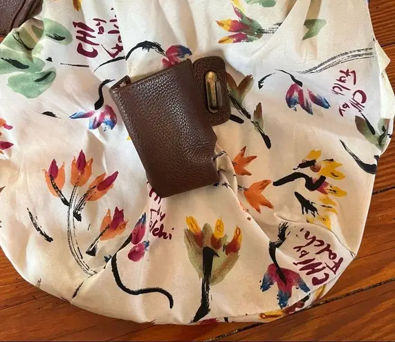 Chi Boho Brown Leather with Snake Skin Handle And Magnetic Snake Skin Closure.