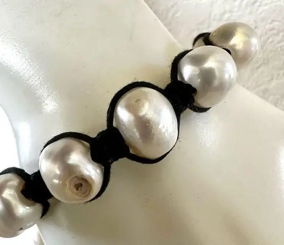 Pearl bracelet on adjustable black silk cord
