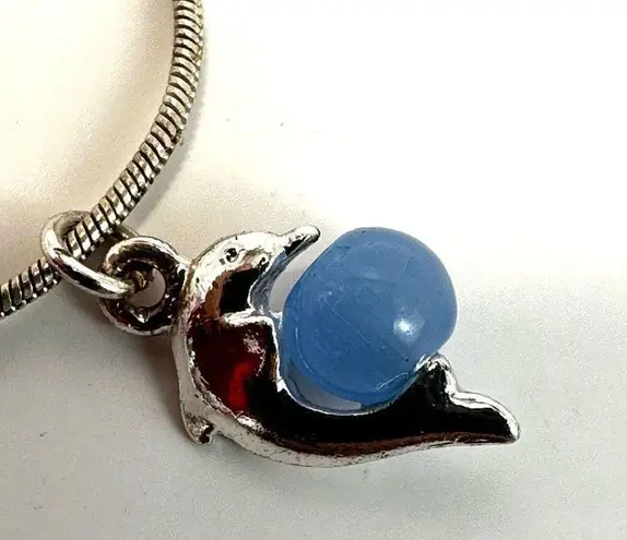 Silver tone blue cats eye dolphin pendant necklace