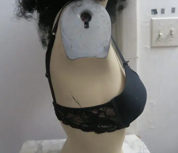 Victoria's Secret push-up demi bra frills around perimeter in black size 34C.