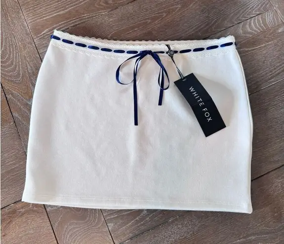 White Fox Boutique NWT White Fox Some You Win White Mini Skirt Size Medium - Image 1