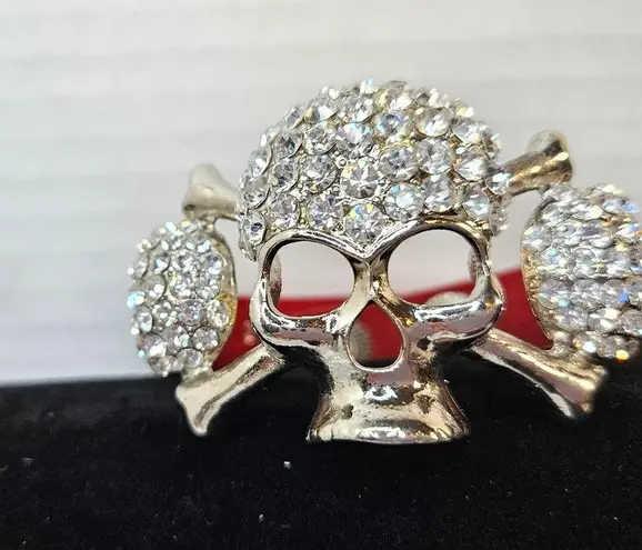 Triple rhinestone skulls with adjustable genuine leather snap bracelet