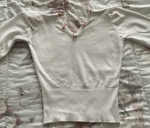 White Little Roses On V