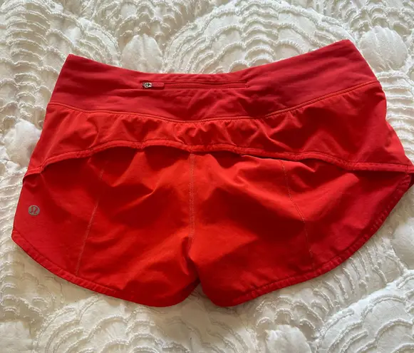 Lululemon Speed Up Mid-Rise Lined Short 4" in Red in size 6