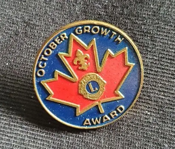 Vintage Lions Club October Growth Award Lapel Pin Canada Maple Leaf Round