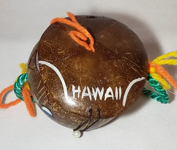 Coconut souvenir purse with painted face pearly bead nose & yarn handle Green